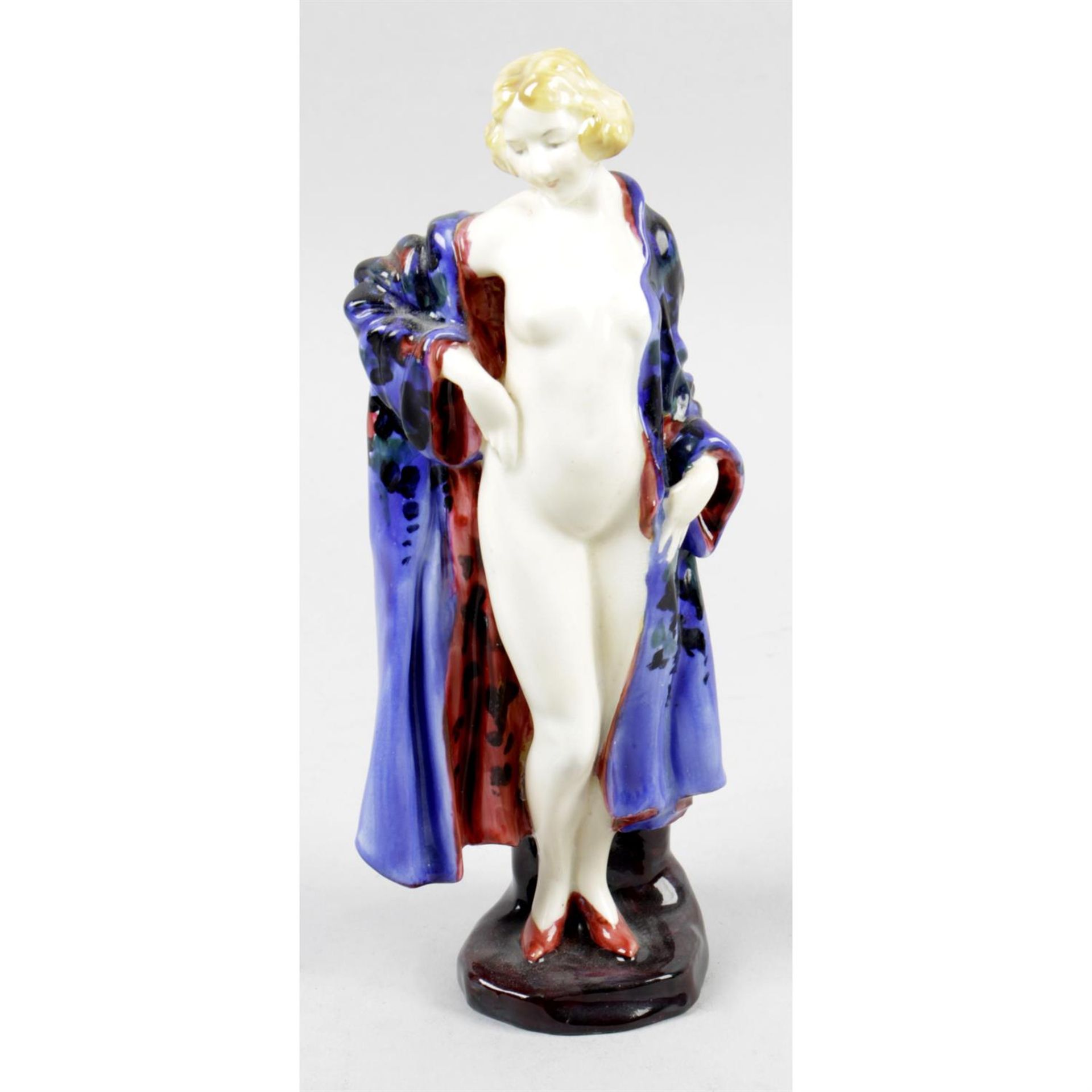 An Art Deco Royal Doulton bone china lady figure entitled 'The Bather'.