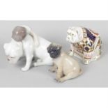 A Bing and Grongdahl figure, a Copenhagen study of a pug dog and a Royal Crown Derby paperweight