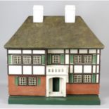 A wooden dolls house.