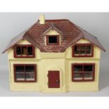 An early 20th century wooden dolls house.