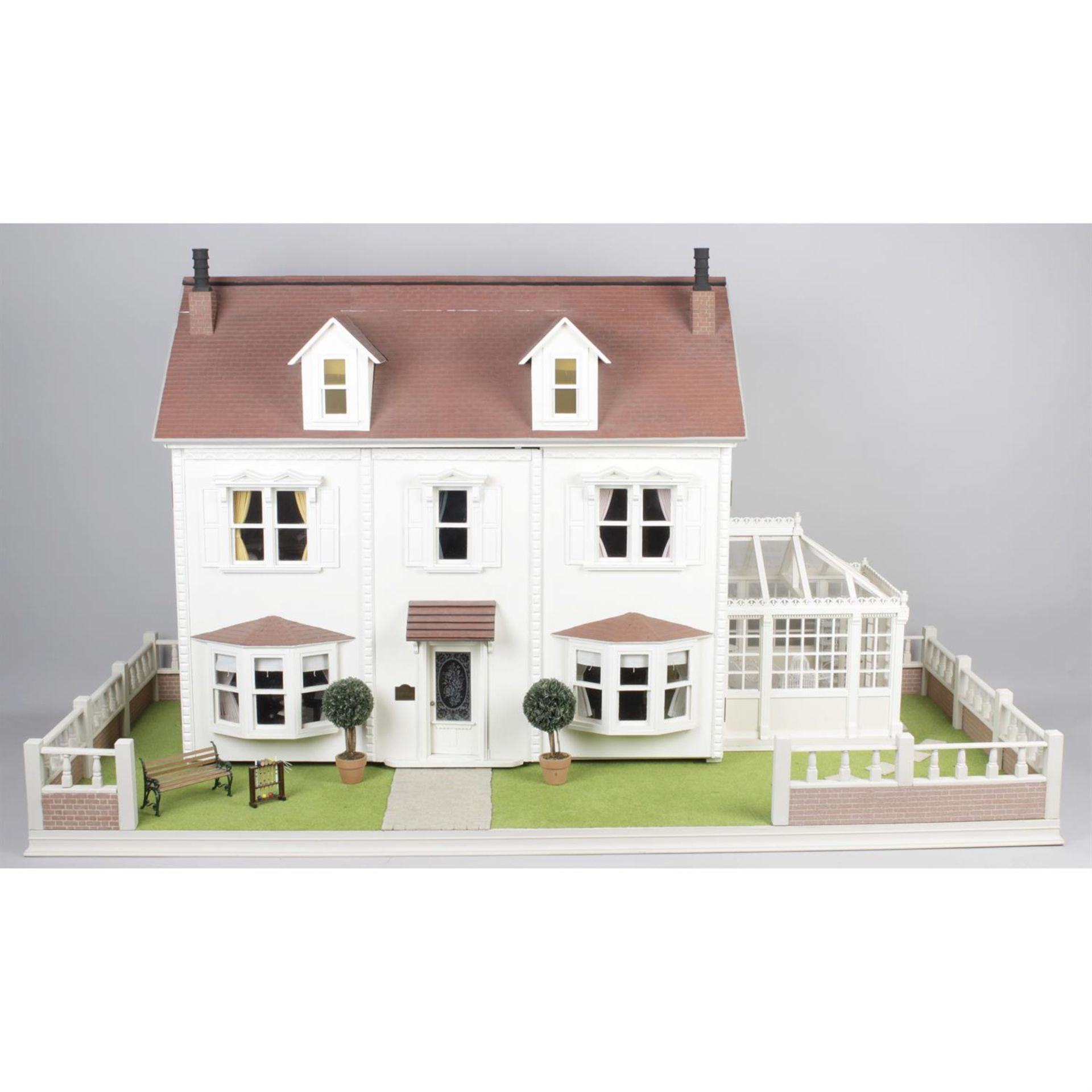 A large wooden dolls house.