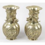 A pair of oriental bronze vases, together with a small cloisonné teapot and cover,