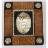 A 19th century needlework miniature.