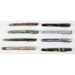 A collection of fourteen assorted vintage pens.