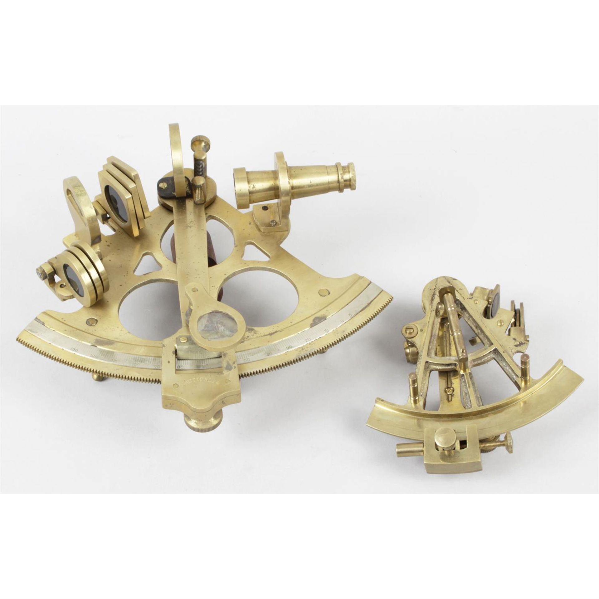 A H. Hughes & Sons Ltd London brass sextant, together with two other sextants. (3)