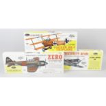Five boxed 'Guillows' scale model aeroplane kits, together with another part built example,