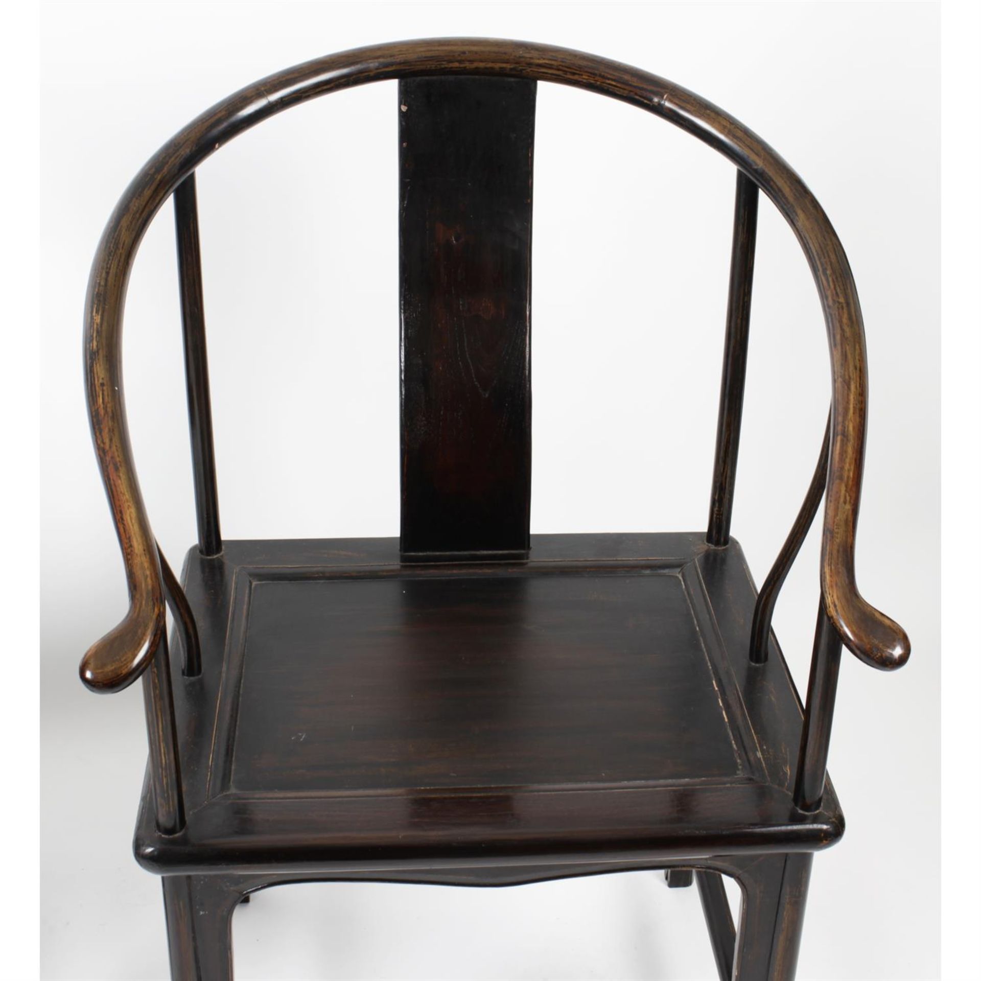 A pair of Chinese stained wooden framed 'horse shoe' chairs. - Image 2 of 3