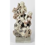 A Chinese carved and painted soapstone figure.