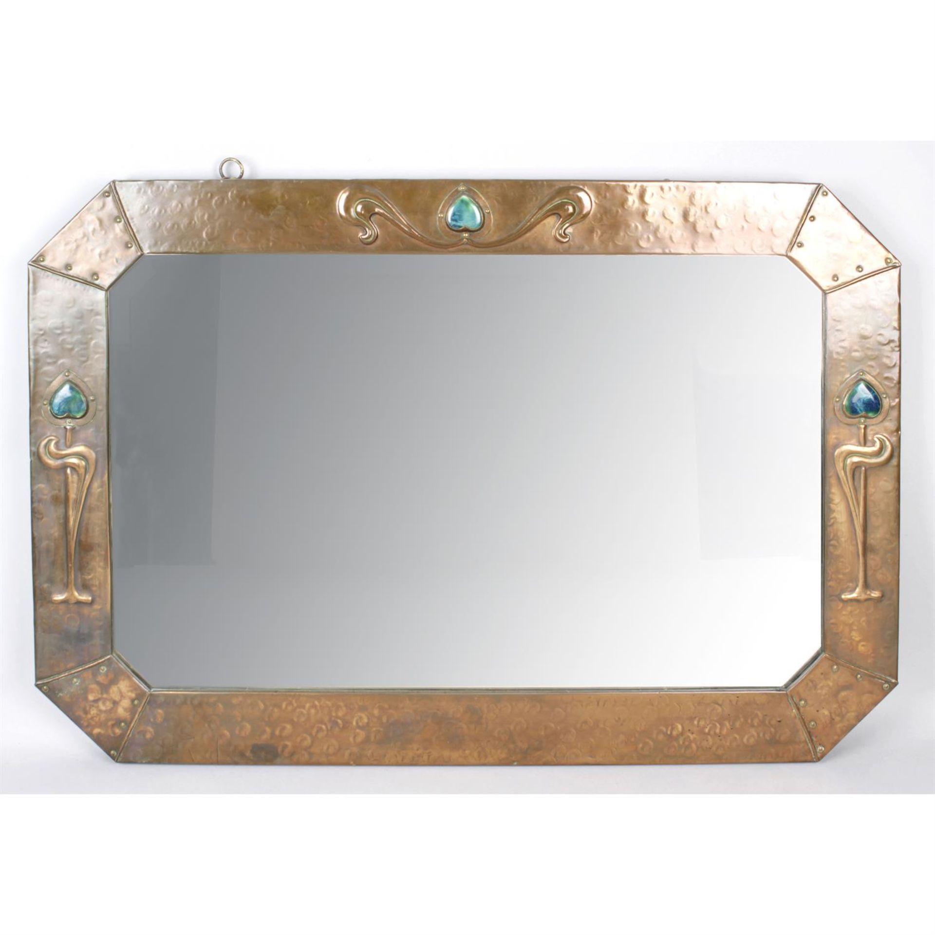 An early 20th century Arts & Crafts copper framed wall mirror.