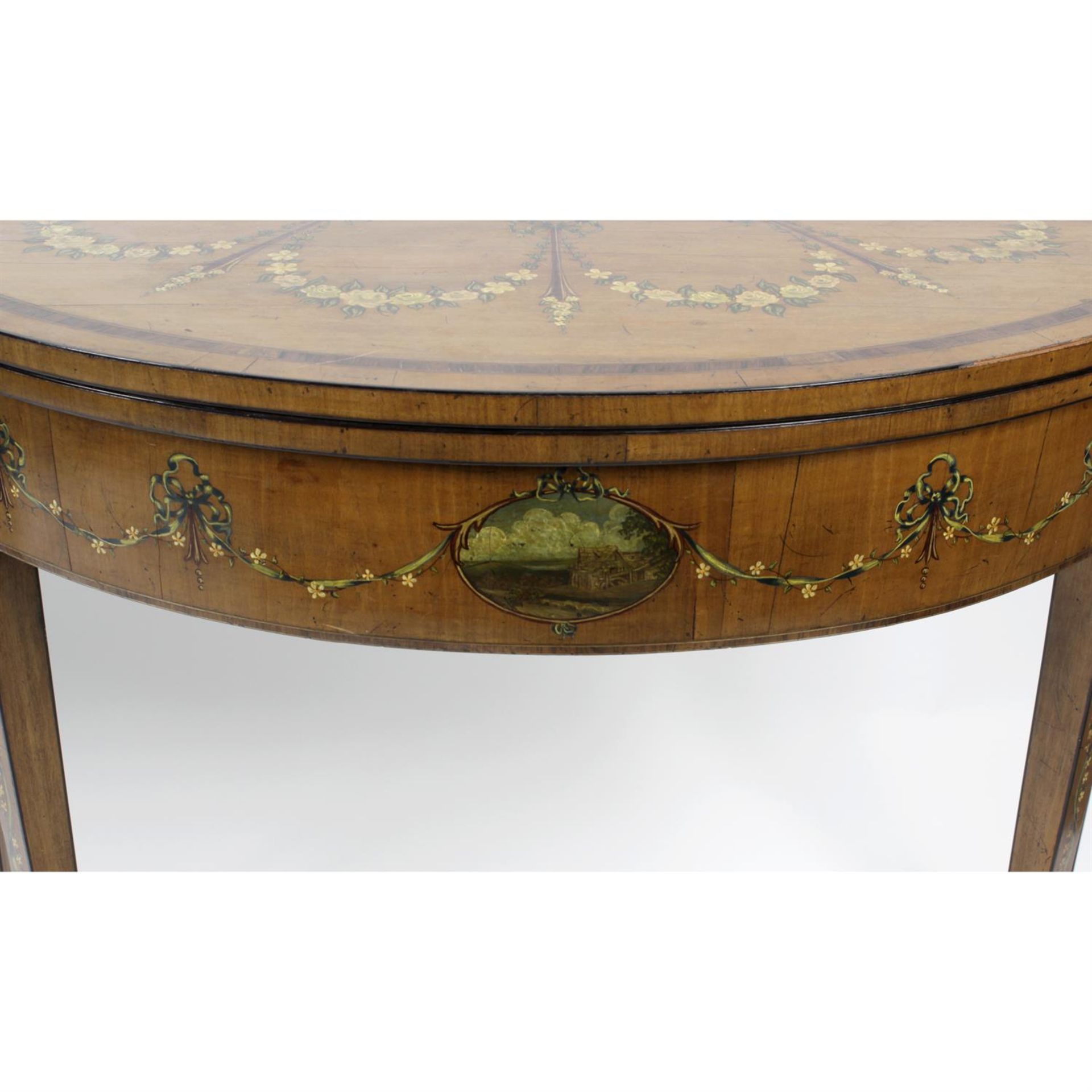 A near pair of early 20th century painted satinwood card tables, each of demi-lune shaped form. - Image 4 of 6