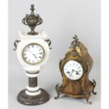 A large, mixed selection of assorted clocks and clock parts.
