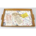A mixed selection of assorted items, to include an oak twin handled tray, various printed sports