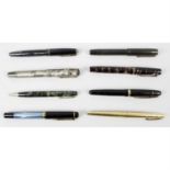 A collection of fourteen assorted vintage pens.