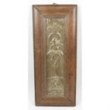 An Art Nouveau bronze wall plaque.