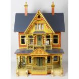 A reproduction 'Gottschalk' style large wooden dolls house.