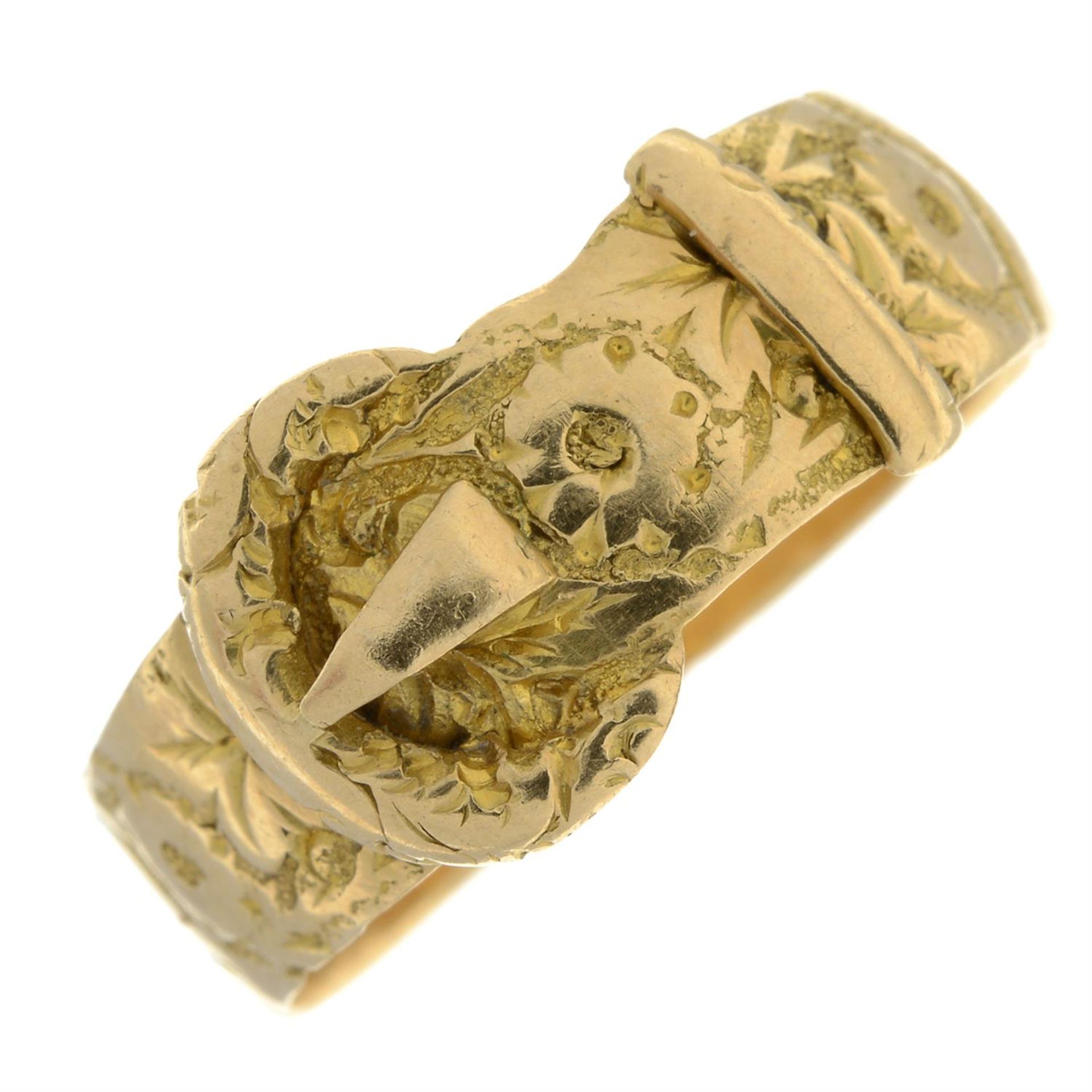 An Edwardian 18ct gold buckle band ring, with floral pattern.