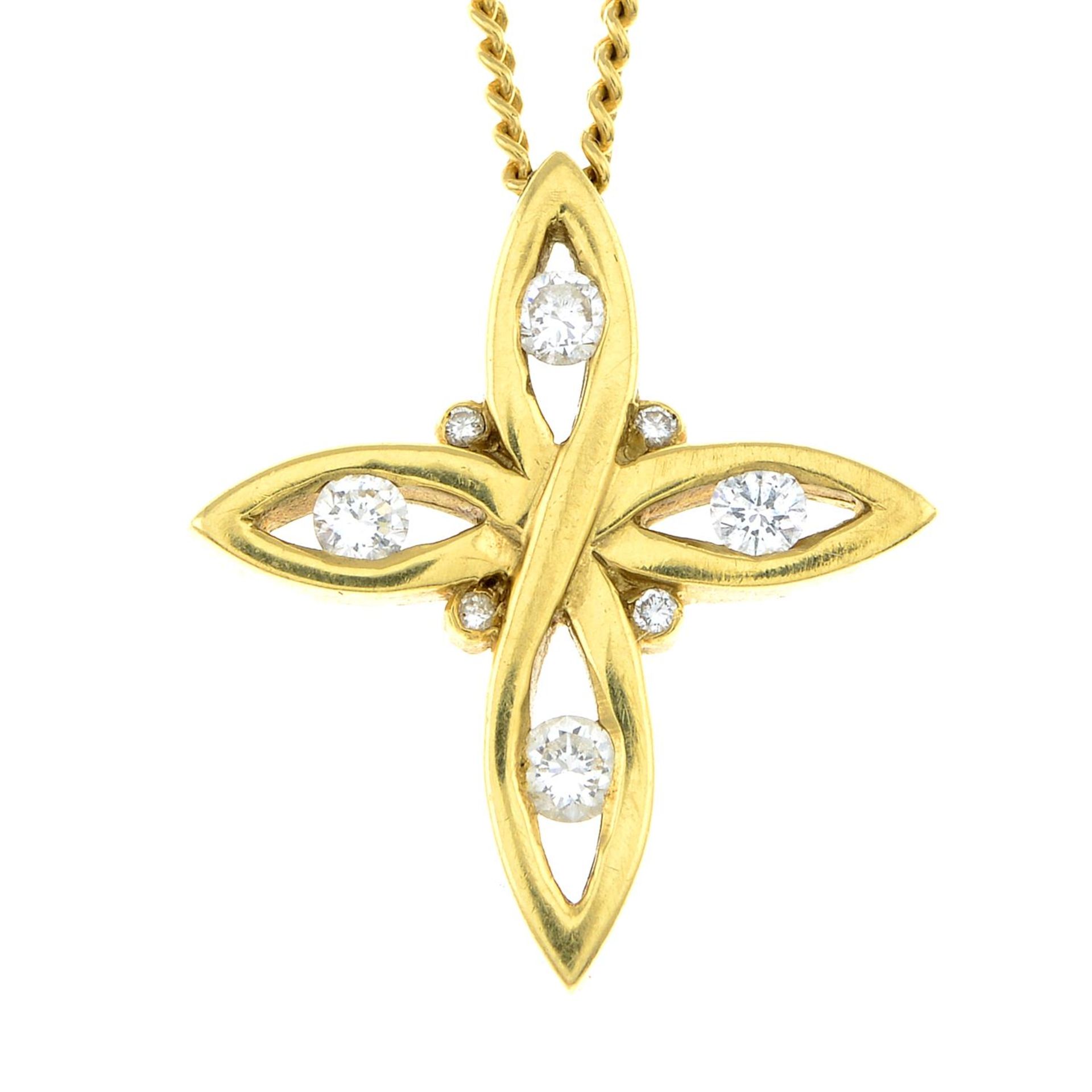 An 18ct gold brilliant-cut diamond abstract cross pendant, on integral chain.