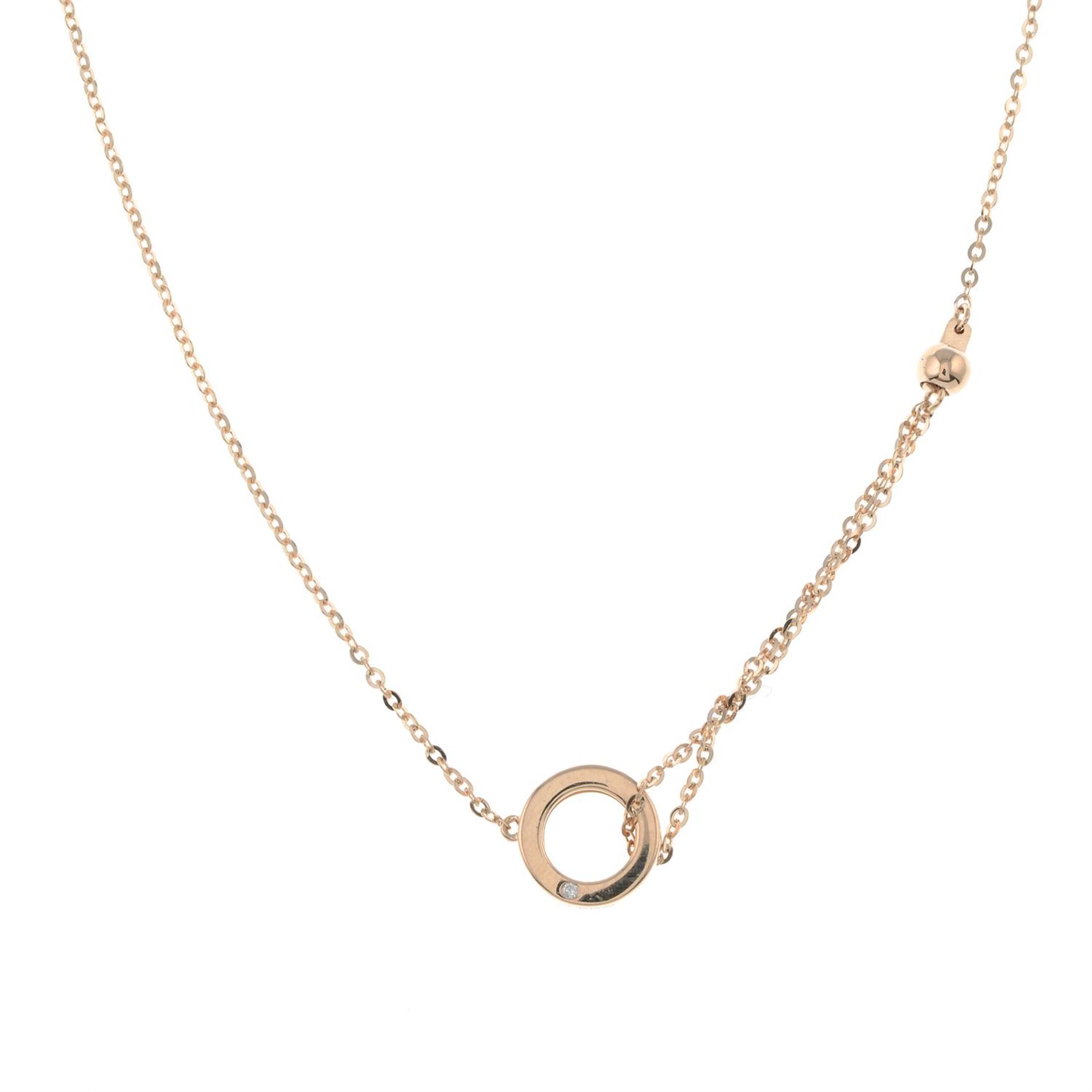 A diamond hoop pendant, with integral chain.