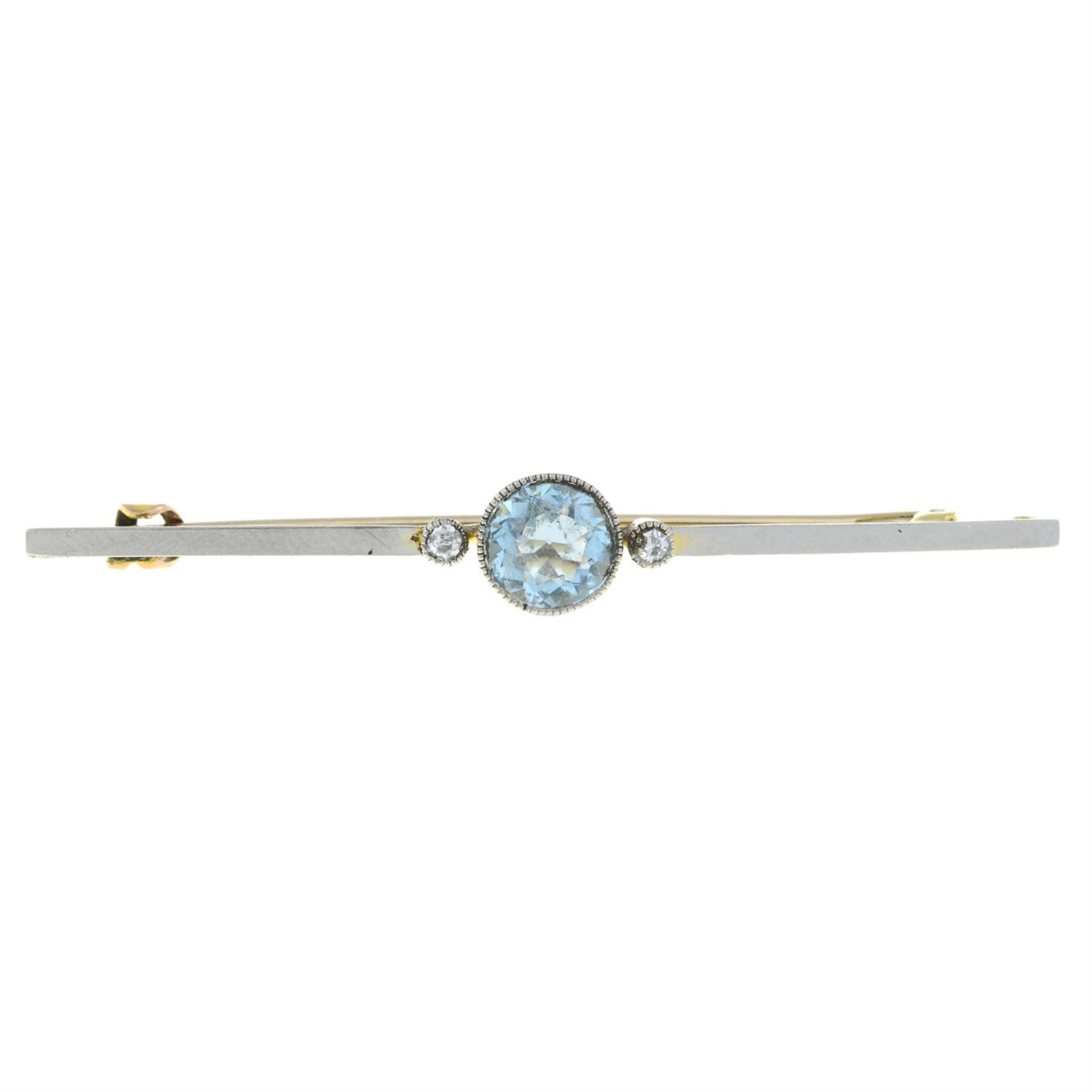 An early 20th century gold and platinum aquamarine and diamond bar brooch.