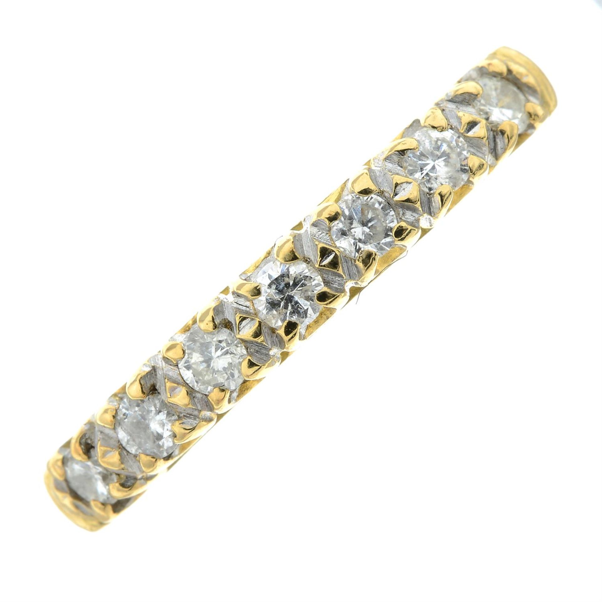 An 18ct gold brilliant-cut diamond seven-stone ring.