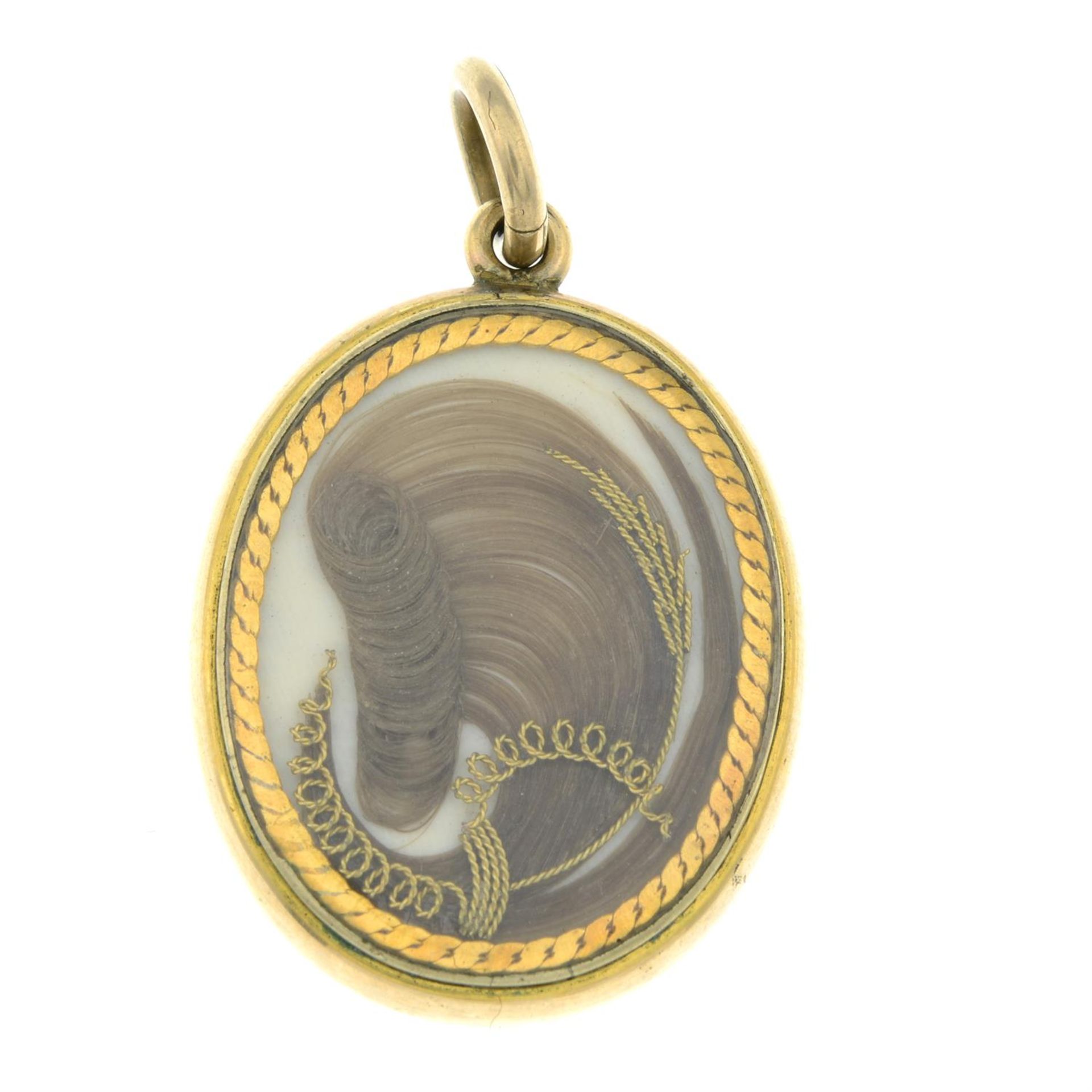 A Victorian 9ct gold enamel and hairwork mourning locket. - Bild 2 aus 2