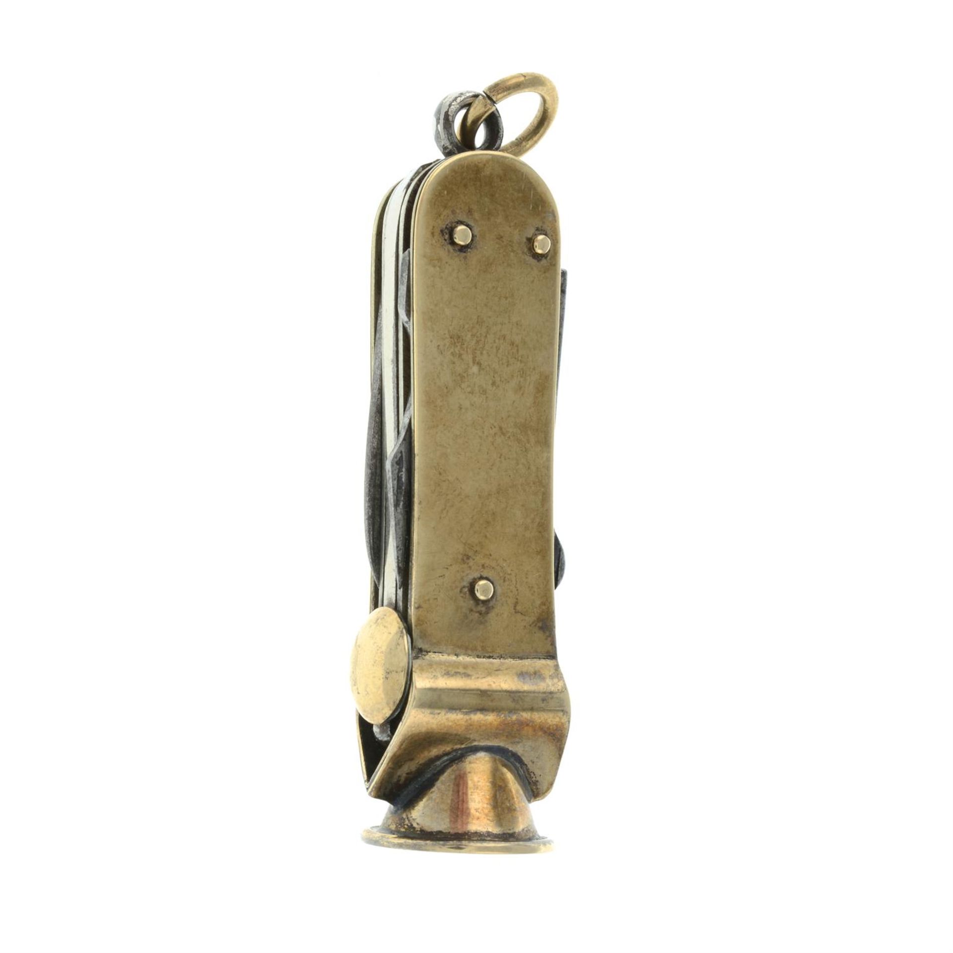 An Edwardian 9ct gold multi-tool cigar cutter fob.