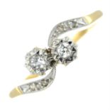 A mid 20th century 18ct gold illusion-set diamond crossover ring.