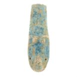 A faience sarcophagus charm.