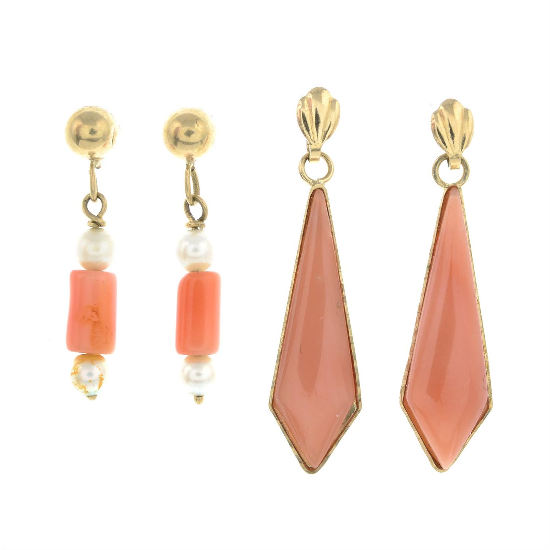 Two pairs of coral stud earrings, one pair with seed pearl spacers.
