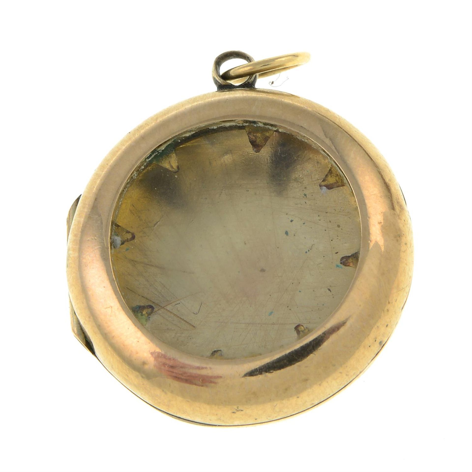 An early 20th century locket pendant, with glazed panel.