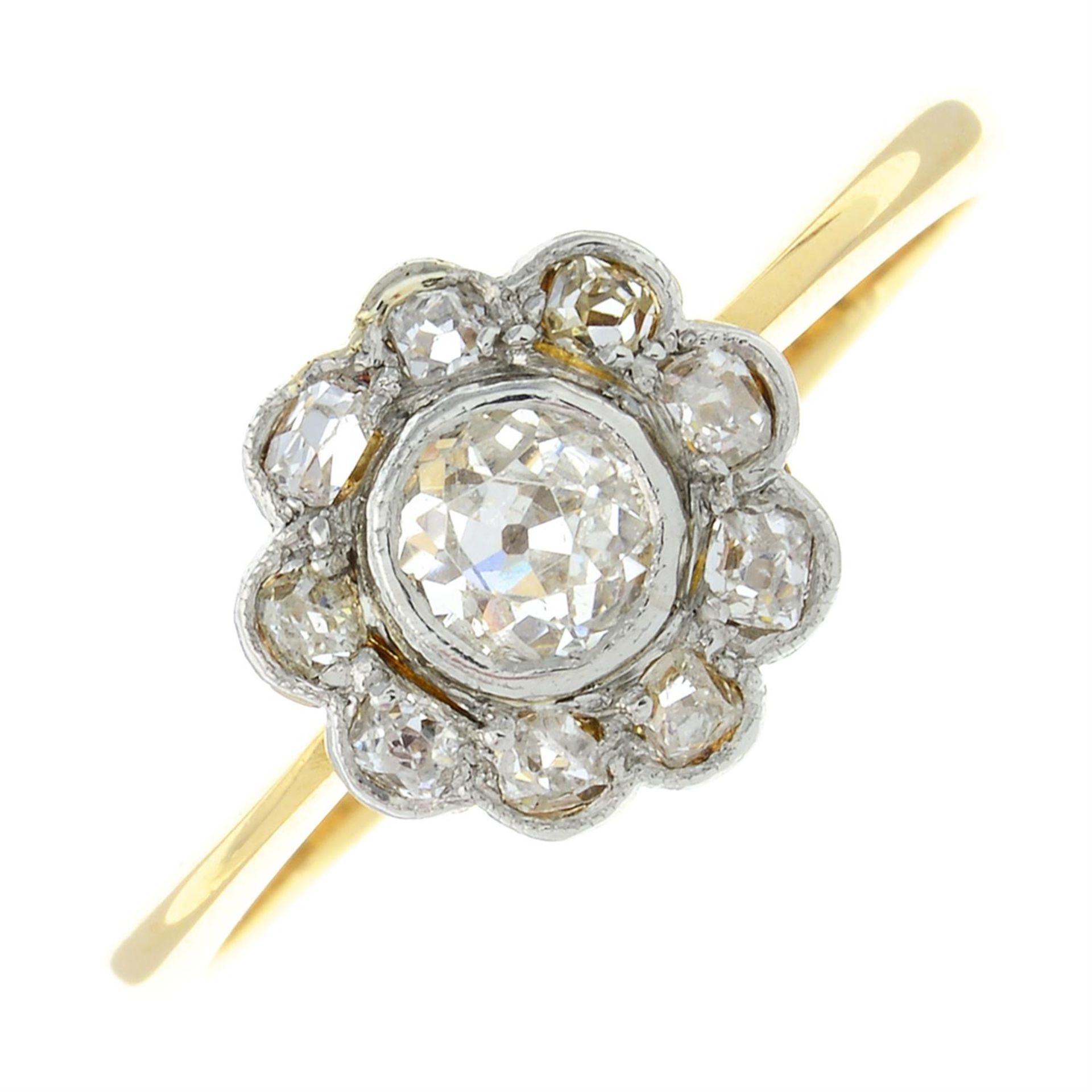 An 18ct gold old-cut diamond floral cluster ring.