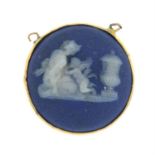 An Edwardian 9ct gold jasperware cameo pendant, likely depicting Aphrodite and Eros, by Wedgwood.