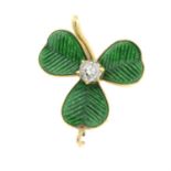 An early 20th century gold old-cut diamond and enamel shamrock charm/pendant.