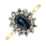 An 18ct gold sapphire and single-cut diamond cluster ring.