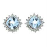 A pair of aquamarine and brilliant-cut diamond cluster earrings.