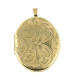 A 9ct gold oval-shape locket, with engraved foliate motif.
