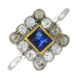 An early 20th century platinum sapphire old-cut diamond cluster ring.