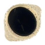 A 9ct gold onyx signet ring.