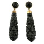 A pair of late Victorian gold carved jet drop earrings.