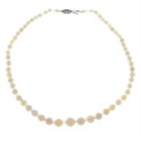 A graduated opal bead single-strand necklace, with colourless bead spacers.