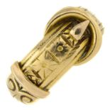 A late Victorian 18ct gold buckle ring, with engraved motif.