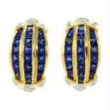 A pair of sapphire and brilliant-cut diamond earrings.