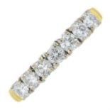 An 18ct gold brilliant-cut diamond half eternity ring.