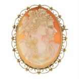 A mid 20th century 9ct gold shell cameo brooch, with safety chain.