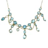 An early 20th century 9ct gold blue zircon drop necklace.