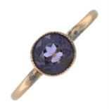 An early 20th century 9ct gold purple spinel single-stone ring.