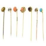 Seven gem-set stickpins.