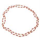 An early 20th century cultured pearl and coral bead necklace, with 9ct gold clasp.