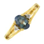 An 18ct gold colour-change alexandrite and diamond three-stone ring.