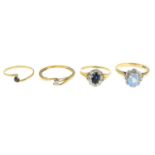 Four 9ct gold gem-set rings.